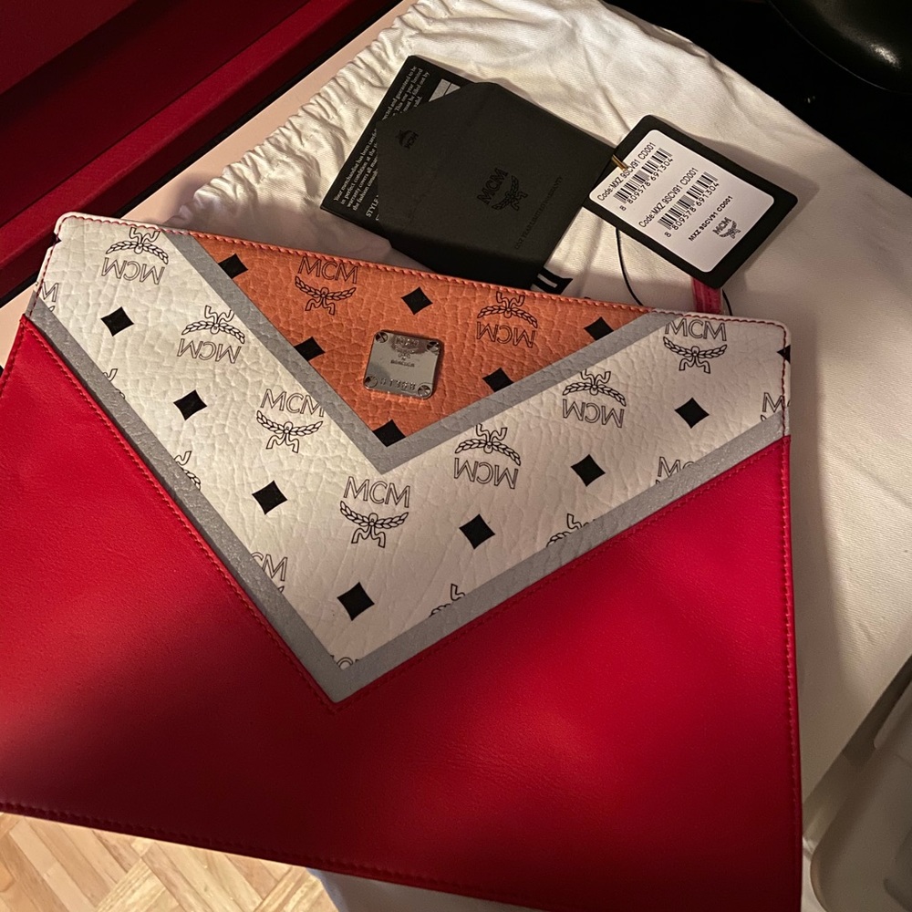 AUTHENTIC NEW NEVER USED MCM ZIP POUCH